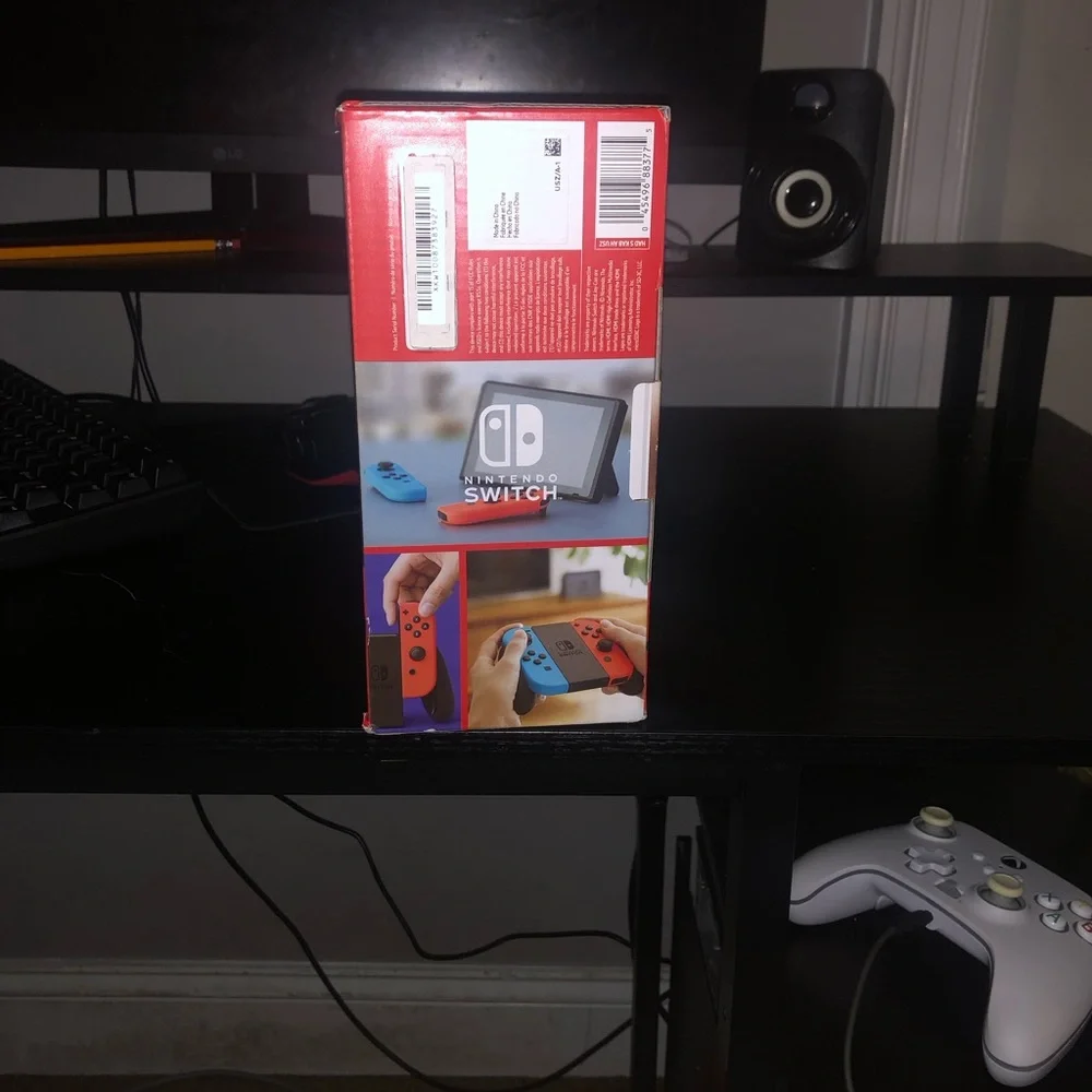 Nintendo Switch Console with Vibrant Blue and Orange Joy-Con